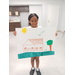 A little girl with her poster with a house, bicycle, and birds on it.