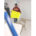 A student posing with his yellow poster.