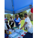 Adults getting school supplies at the Back to School Bash.