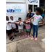 A group of kids outside the CityBoy Treats van.