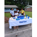 A group of people behind a table for Child First.