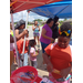 A group of people getting supplies for school.