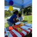 Giving school supplies to kids.