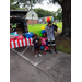 Happy clown with kids at the Back to School Bash.