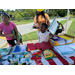 People at the Back to School Bash getting school supplies.