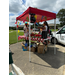 People at the Back to School event giving out snacks.