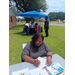 People filling out paperwork.