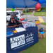 People outside at the Access East Healthy Opportunities table.