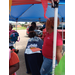 People setting up tables with school supplies.