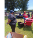 Volunteers giving out school supplies.